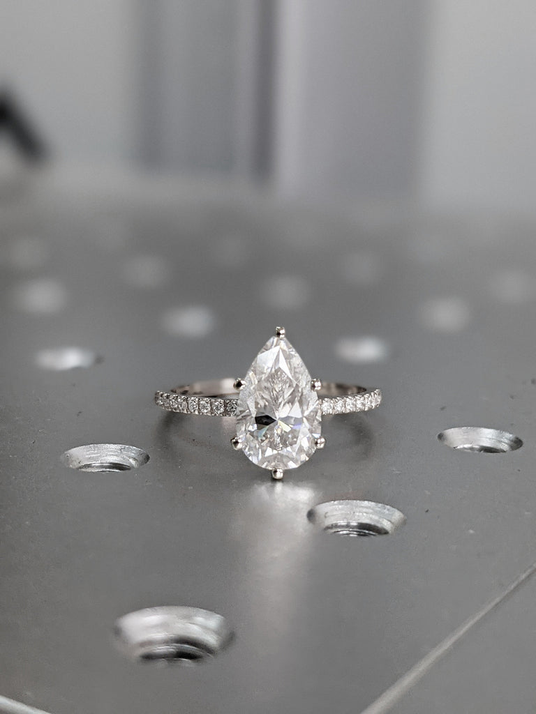 2.5 carat pear engagement ring skinny pear moissanite 11.5x7.2 1.6 ratio 1.6mm thin band & hidden halo diamond ring