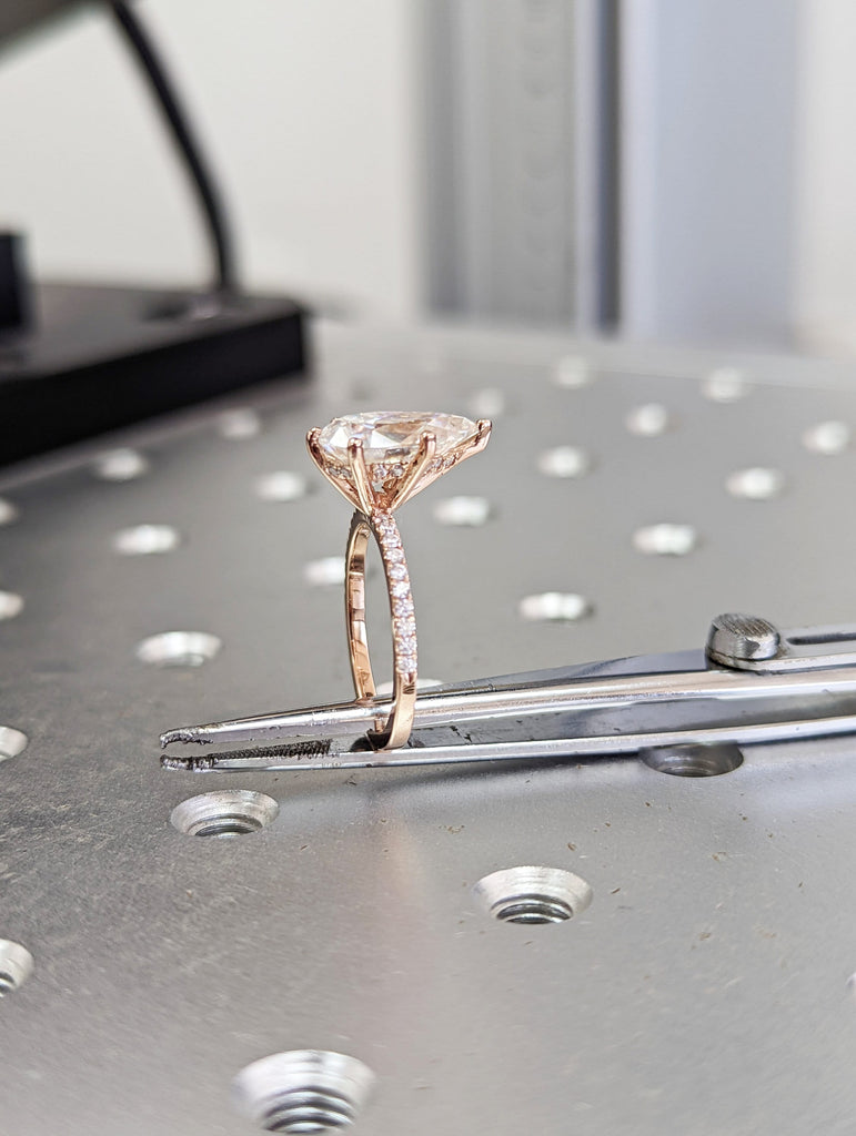 VVS Moissanite 14k Rose Gold Wedding Ring: Pear shape Hidden Halo with Thin Paved Half Eternity Band