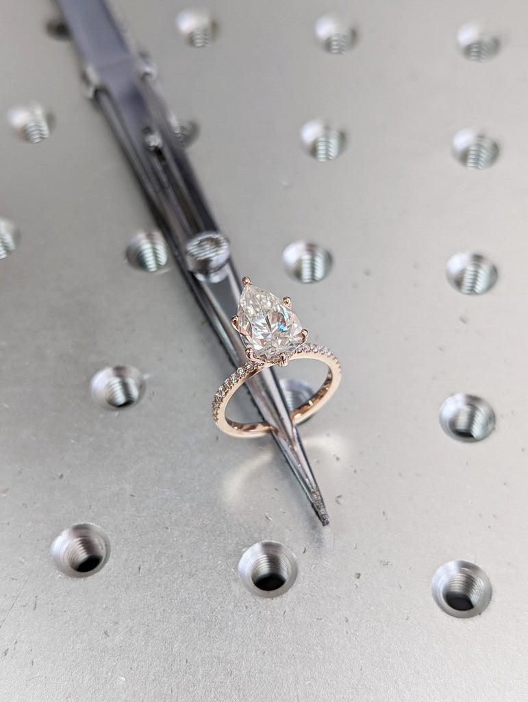 VVS Moissanite 14k Rose Gold Wedding Ring: Pear shape Hidden Halo with Thin Paved Half Eternity Band