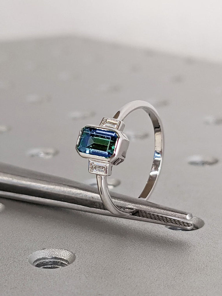 Montana Sapphire Engagement Ring, Bezel Set 3 Stone Trellis Ring, Emerald Cut Peacock Blue Green Teal Sapphire, Baguette Diamond/Moissanite