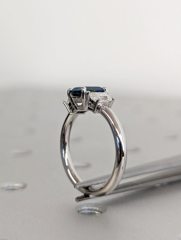 Three Stone Emerald Cut Teal Sapphire Engagement Ring, Side Trapezoid Moissanite, Three Stone Engagement Ring, 1CT Montana Sapphire, Trellis