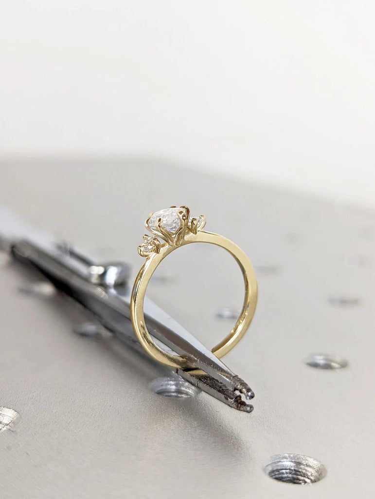 1-2CT Marquise Cut Moissanite Ring with Side Round Stones | 14k Yellow Gold Engagement Ring