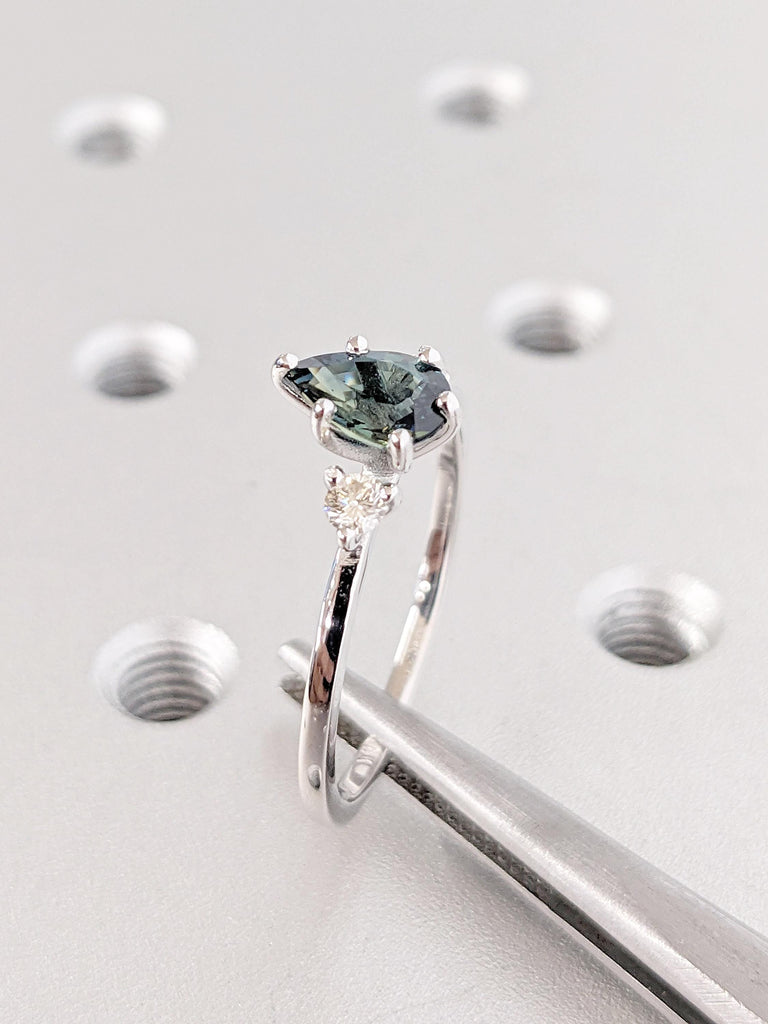 Pear cut Teal Sapphire and Round Moissanite Ring | September Birthstone