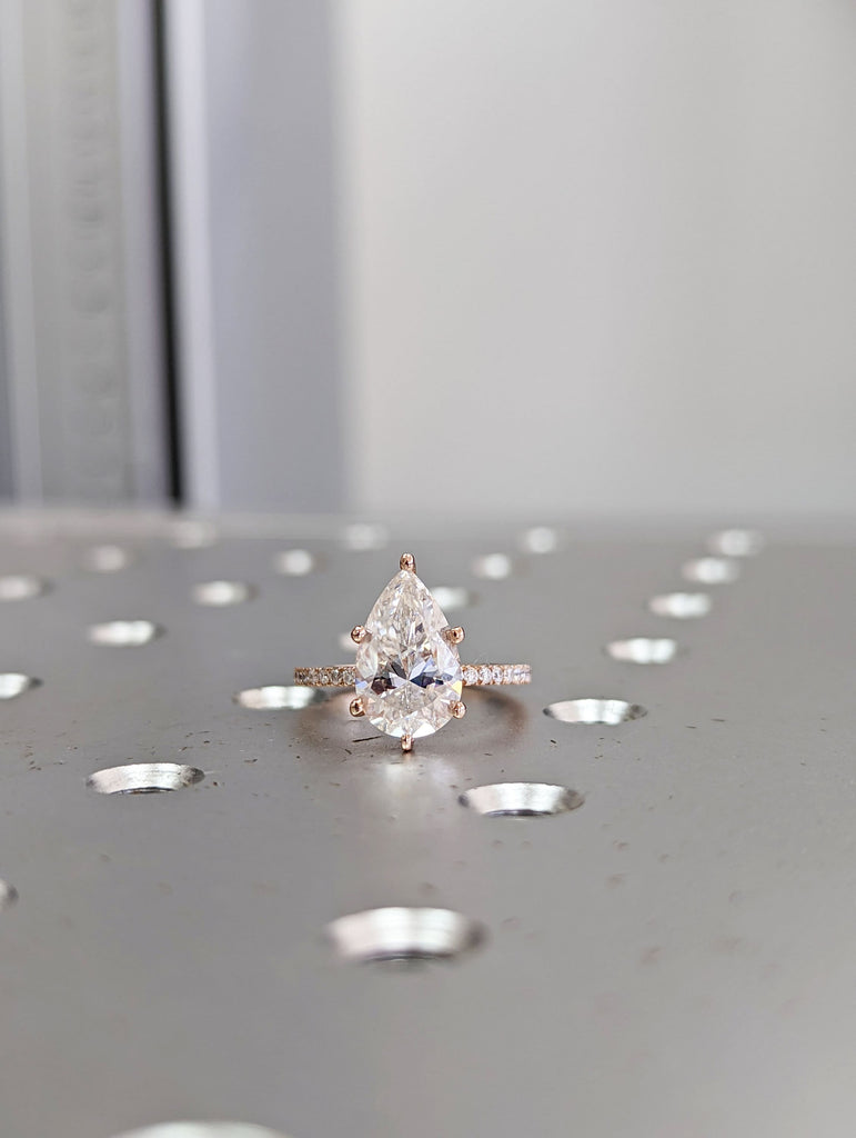 VVS Moissanite 14k Rose Gold Wedding Ring: Pear shape Hidden Halo with Thin Paved Half Eternity Band