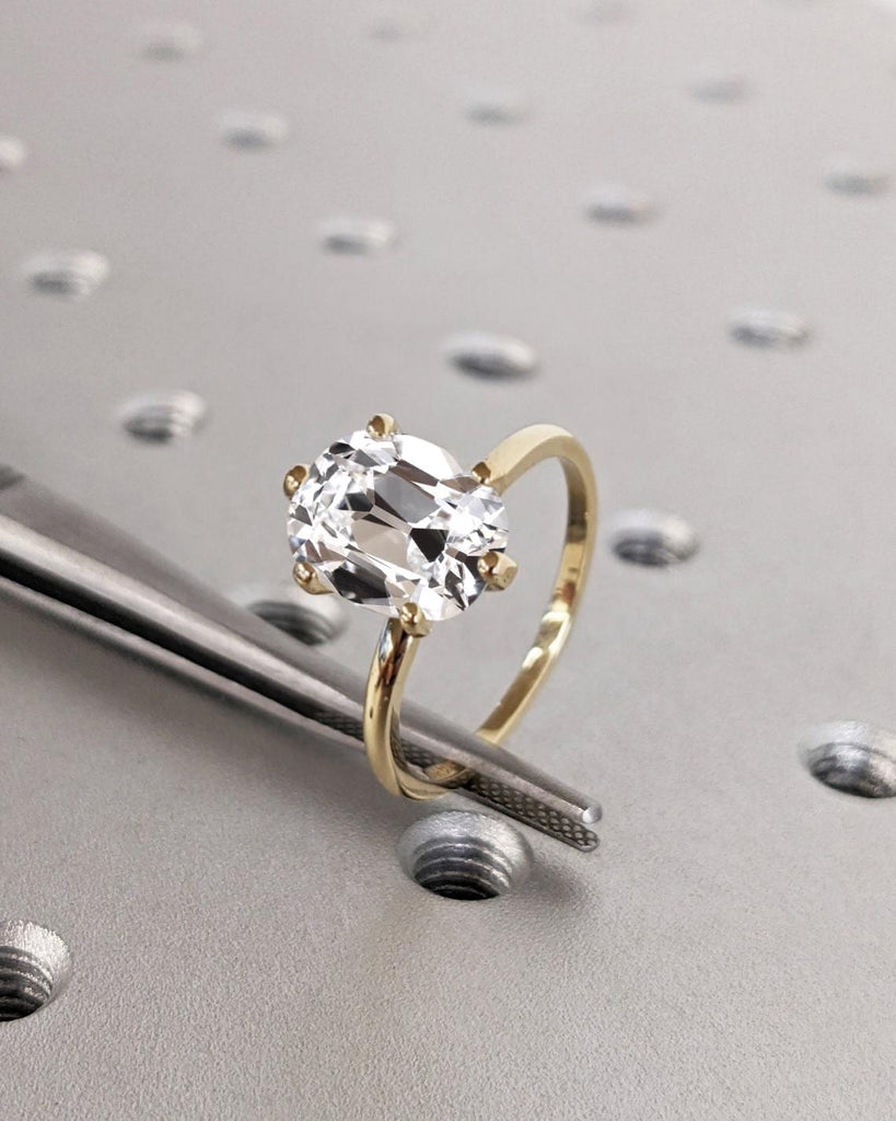 14k Yellow Gold OMC Moissanite Promise Ring: Elongated Cushion cut Solitaire
