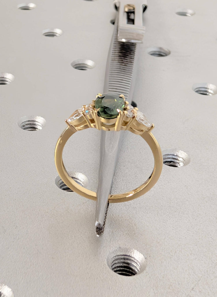 18K Yellow Gold Oval Teal Sapphire Engagement Ring with Diamond Cluster image #13
