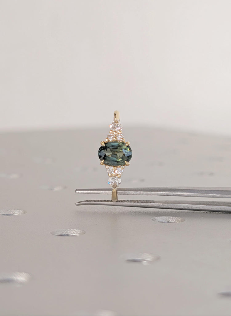 18K Yellow Gold Oval Teal Sapphire Engagement Ring with Diamond Cluster image #11