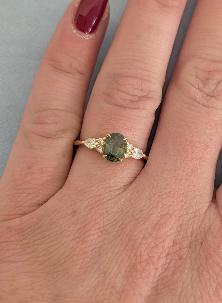 18K Yellow Gold Oval Teal Sapphire Engagement Ring with Diamond Cluster