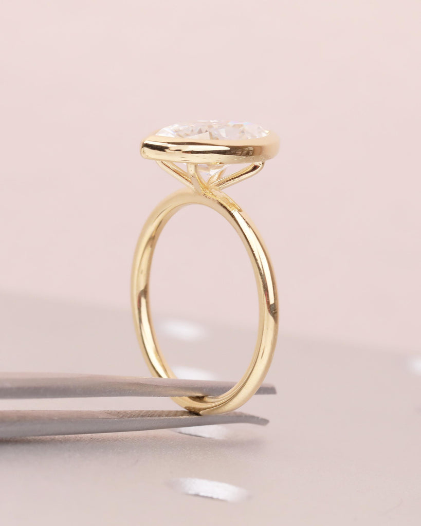 Minimalist 18k Gold Marquise Moissanite Engagement Ring in Bezel Setting image #17