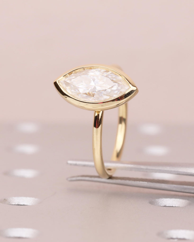 Minimalist 18k Gold Marquise Moissanite Engagement Ring in Bezel Setting image #14