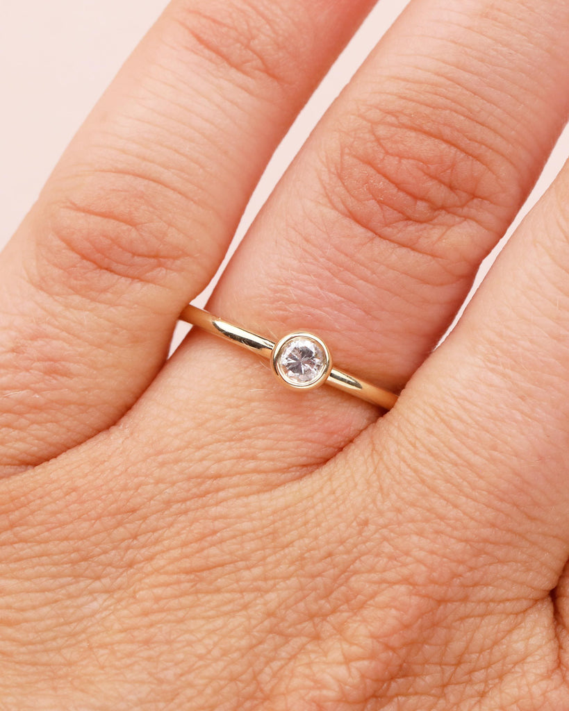 14k Gold Petite Diamond Ring in Bezel Setting