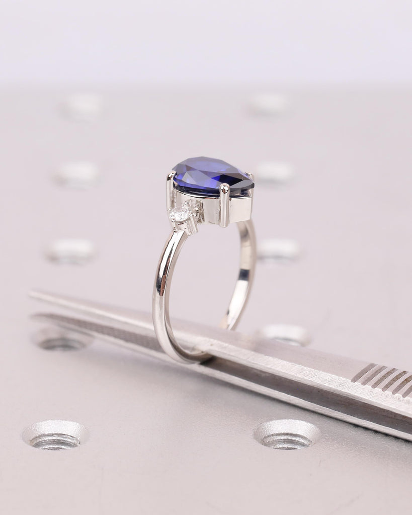 Pear Cut Blue Sapphire Engagement Ring with Diamond Accents, Platinum Three Stone Ring image #15