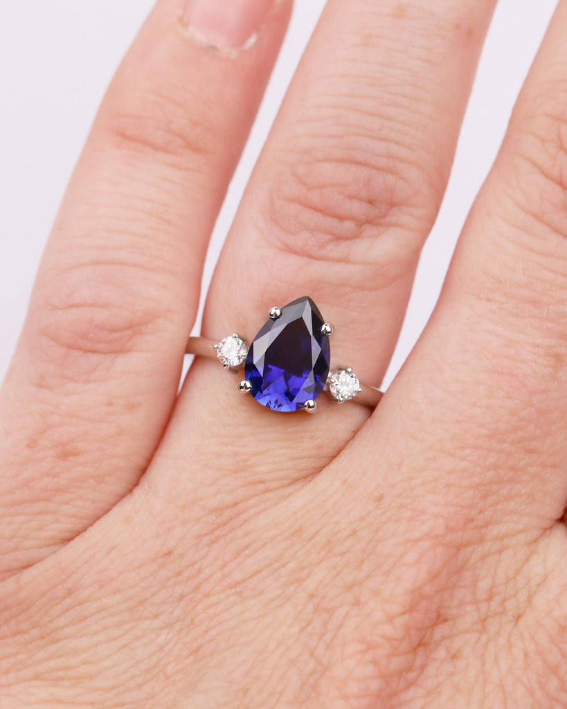 Pear Cut Blue Sapphire Engagement Ring with Diamond Accents, Platinum Three Stone Ring image #9