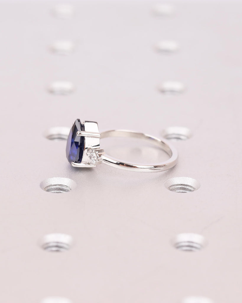 Pear Cut Blue Sapphire Engagement Ring with Diamond Accents, Platinum Three Stone Ring image #16