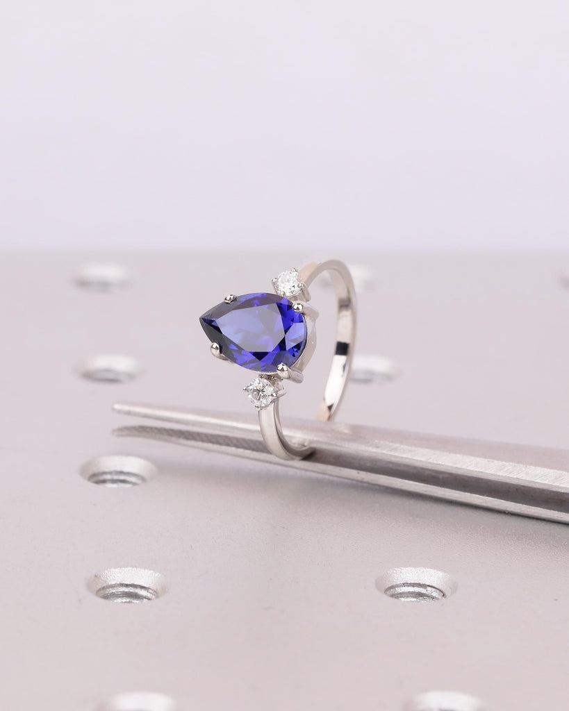Pear Cut Blue Sapphire Engagement Ring with Diamond Accents, Platinum Three Stone Ring image #14