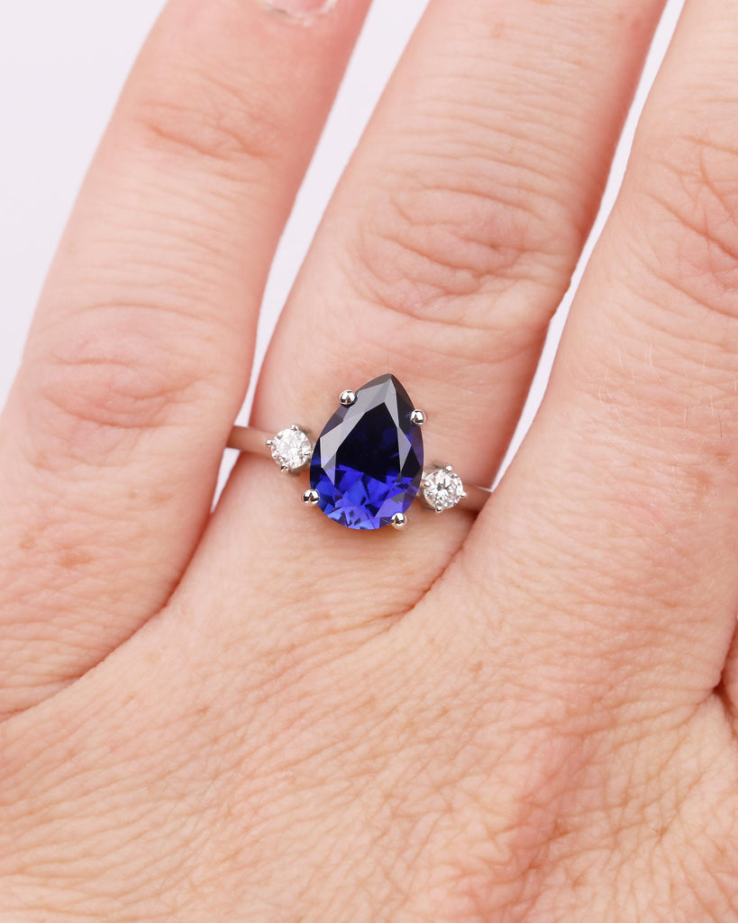 Pear Cut Blue Sapphire Engagement Ring with Diamond Accents, Platinum Three Stone Ring image #1