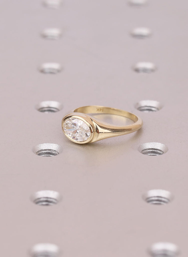 Half Bezel Set East-West Oval Moissanite Ring: , 14K Yellow Gold, Modern Signet Style image #9