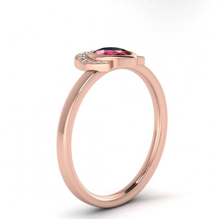 14k rose gold Cato halo pear ruby and diamond ring, pear shaped bezel, halo, pave accents