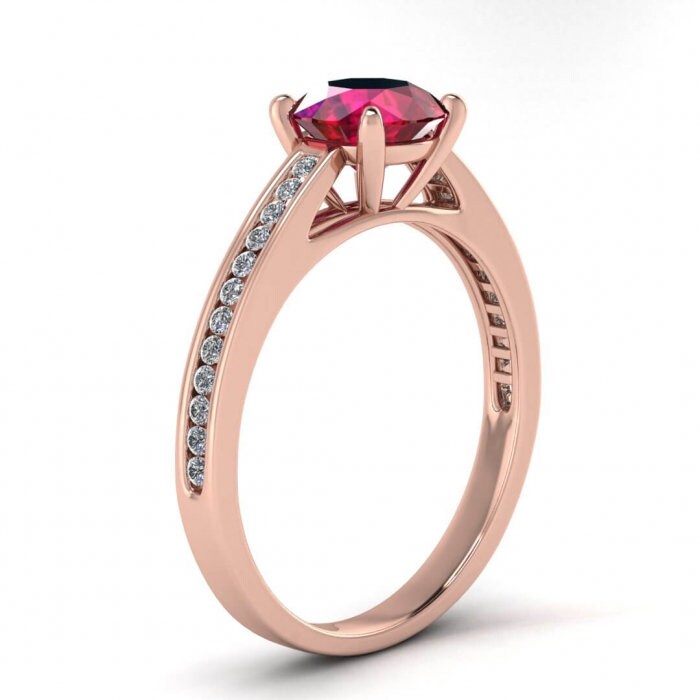 14k rose gold Cassie delicate channel ruby and diamond engagement ring (1/9 ct. tw.), round cut, bridged shank, cathedral design