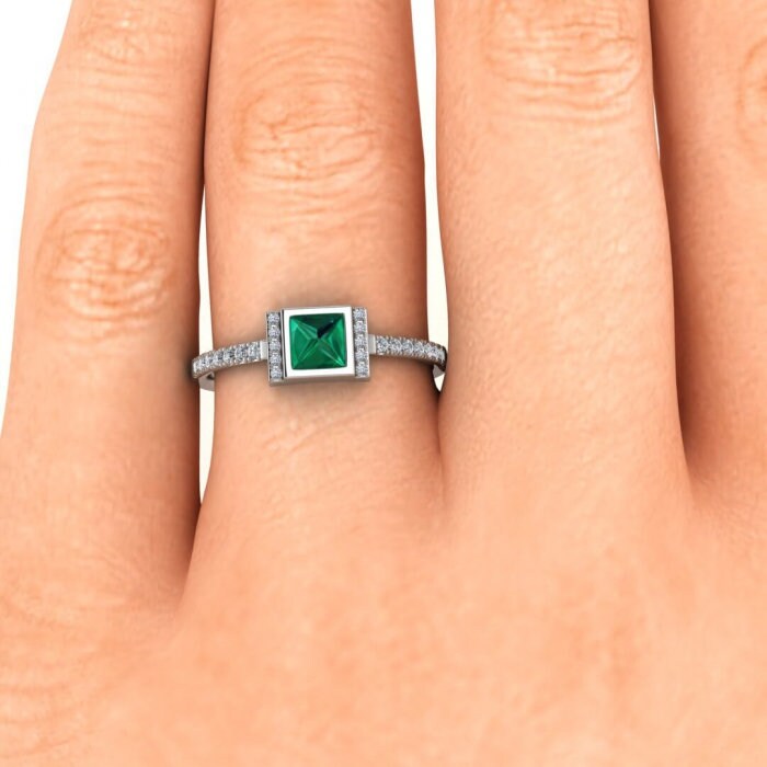 White Gold Upside Down Princess Cut Emerald And Diamond Ring (1/7 Ct. Tw.) High Profile Setting Split Shank Prong Setting Aurora