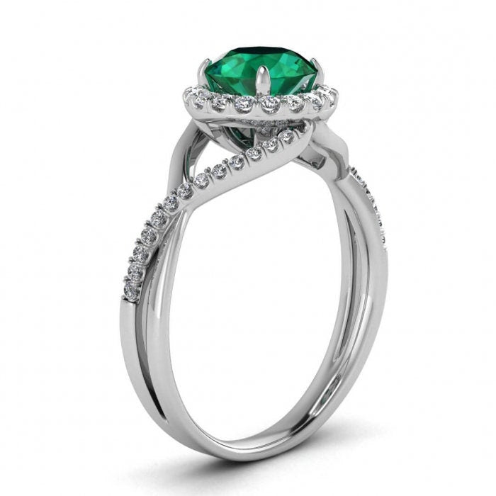 White Gold Twisted Halo Emerald And Diamond Engagement Ring (1/5 Ct. Tw.) Pave Set Accent Gemstone Halo Setting Entwined Open Gallery Joy