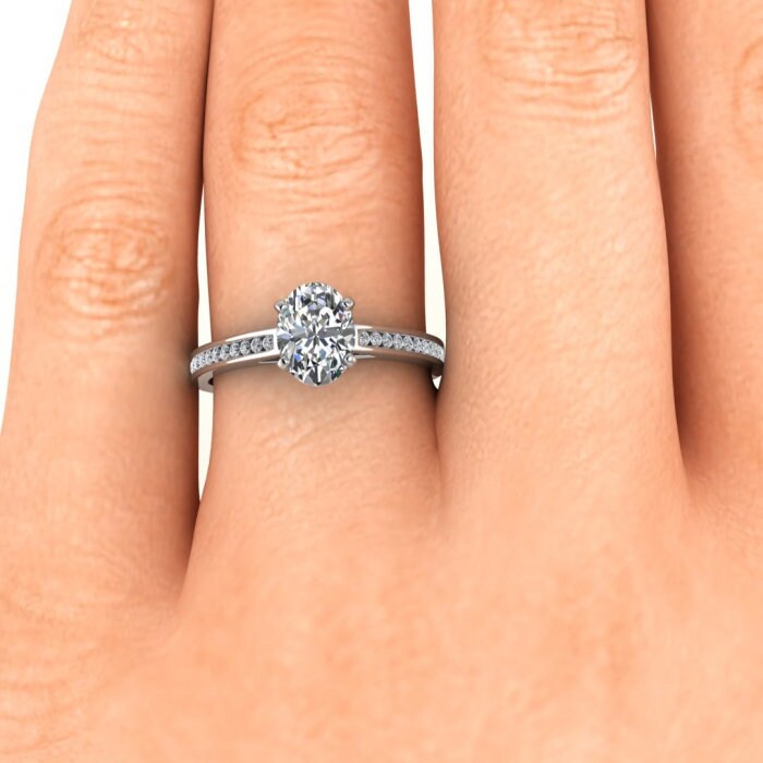 White Gold Delicate Channel Oval Moissanite Engagement Ring (1/9 Ct. Tw.) Round Cut Channel, Bridged Shank, Cathedral Design Setting Cassie