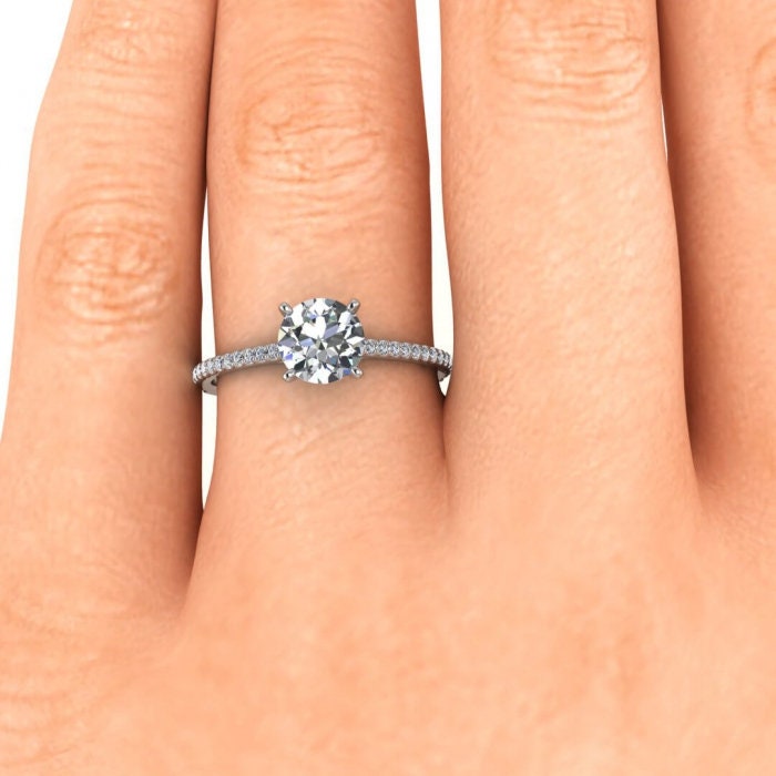 White Gold Micro Pave Moissanite Engagement Ring (1/6 Ct. Tw.) Micro Pave Accents, Prongs Setting Center Gemstone Anahi