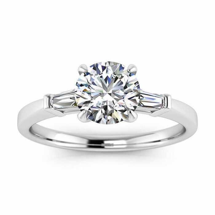 White Gold Moissanite Tapered Baguette Ring (1/5 Ct. Tw.) Tapered Baguette, Tapered Band, Bar Set Gemstone, Claw Prongs, Kara