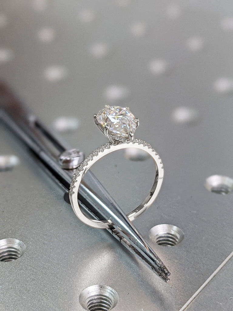 2.5 carat pear engagement ring skinny pear moissanite 11.5x7.2 1.6 ratio 1.6mm thin band & hidden halo diamond ring