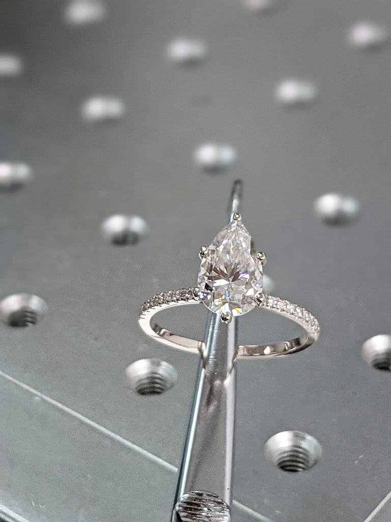 2.5 carat pear engagement ring skinny pear moissanite 11.5x7.2 1.6 ratio 1.6mm thin band & hidden halo diamond ring