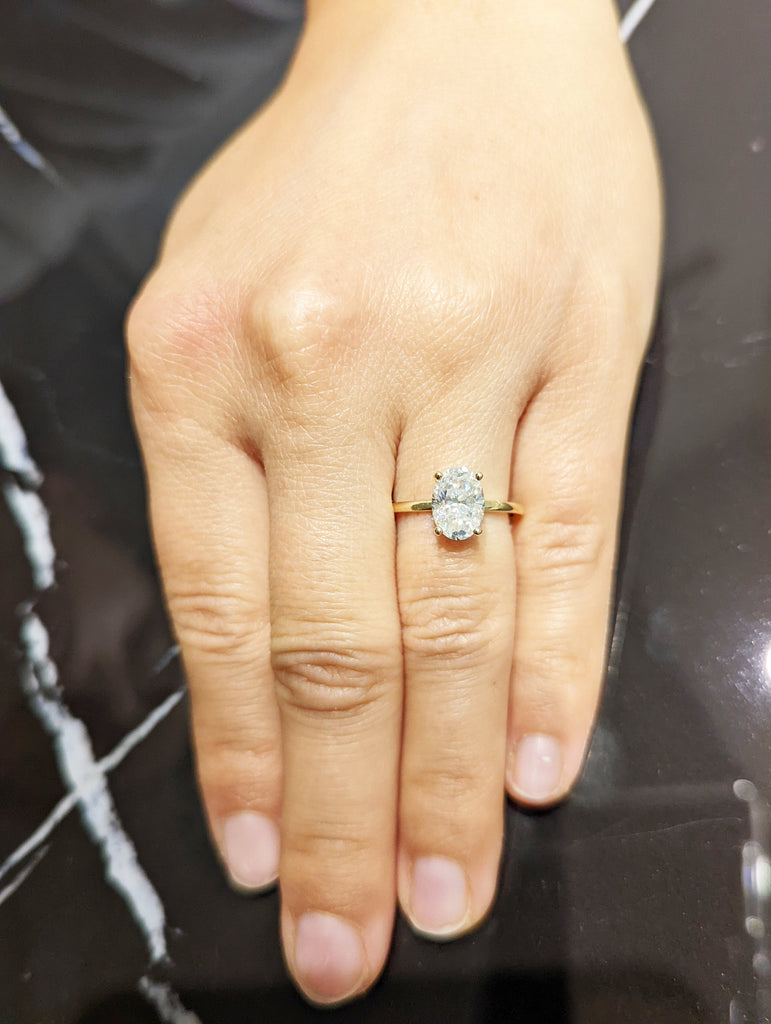 1.5 ct. Hidden halo engagement ring, solitaire oval moissanite ring, Hidden Halo 6x8mm Oval Cut Solitaire Engagement Ring in 14K White gold.