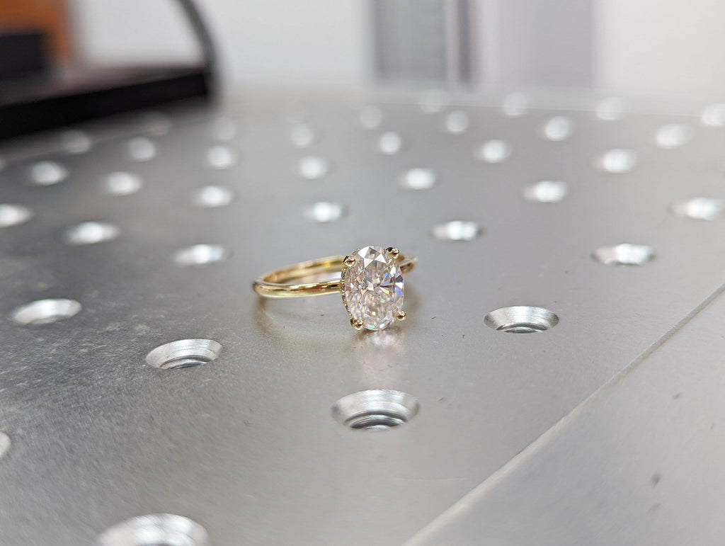 1.5 ct. Hidden halo engagement ring, solitaire oval moissanite ring, Hidden Halo 6x8mm Oval Cut Solitaire Engagement Ring in 14K White gold.