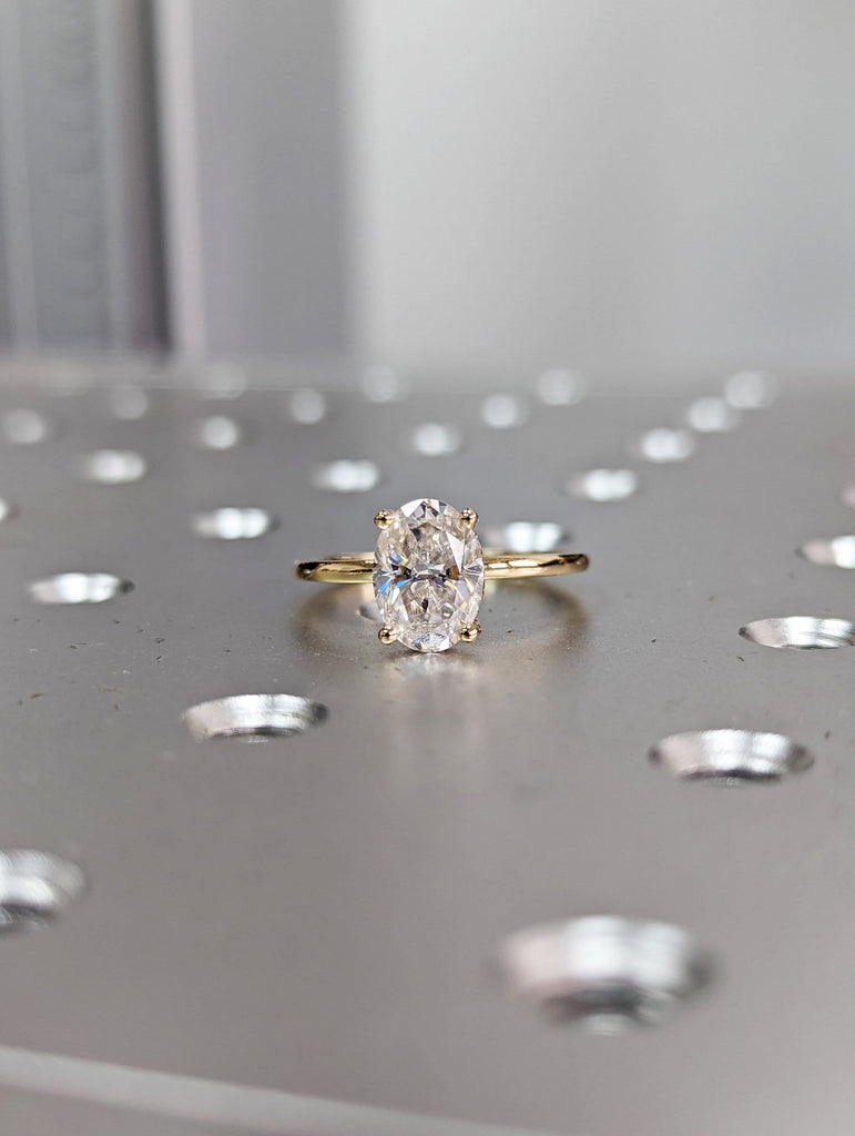 1.5 ct. Hidden halo engagement ring, solitaire oval moissanite ring, Hidden Halo 6x8mm Oval Cut Solitaire Engagement Ring in 14K White gold.