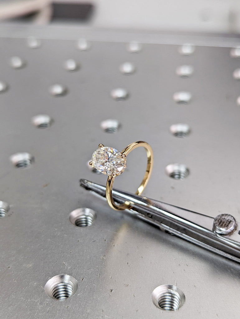 1.5 ct. Hidden halo engagement ring, solitaire oval moissanite ring, Hidden Halo 6x8mm Oval Cut Solitaire Engagement Ring in 14K White gold.