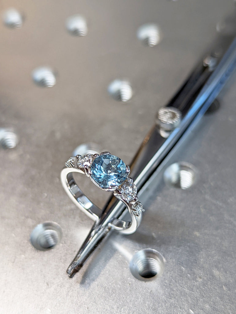 White Gold Three Stone Aquamarine And Diamond Ring (1/2 Ct. Tw.) Three Stone Setting Engagement Ring High Profile Unique Setting Brianna