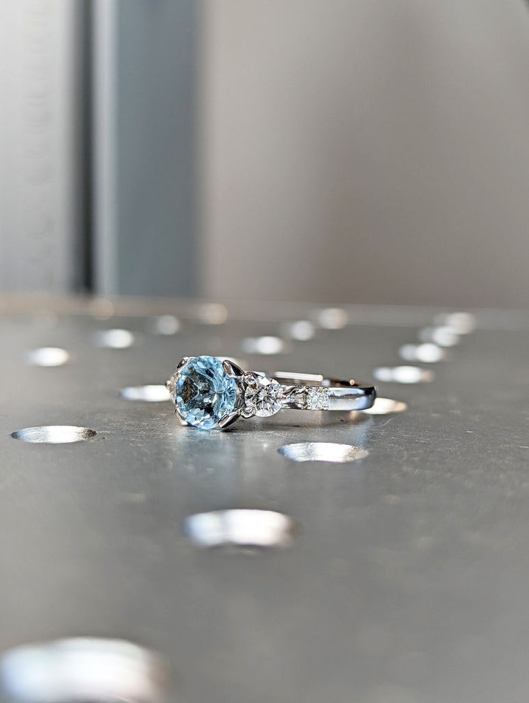 White Gold Three Stone Aquamarine And Diamond Ring (1/2 Ct. Tw.) Three Stone Setting Engagement Ring High Profile Unique Setting Brianna