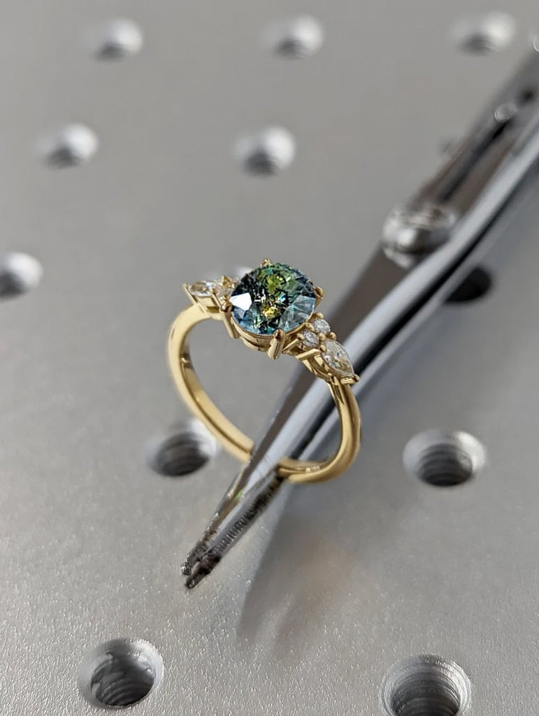 Blue Green sapphire ring. Peacock engagement ring. Oval Teal sapphire ring. 14k yellow gold engagement ring. Cluster diamond ring. Art deco.