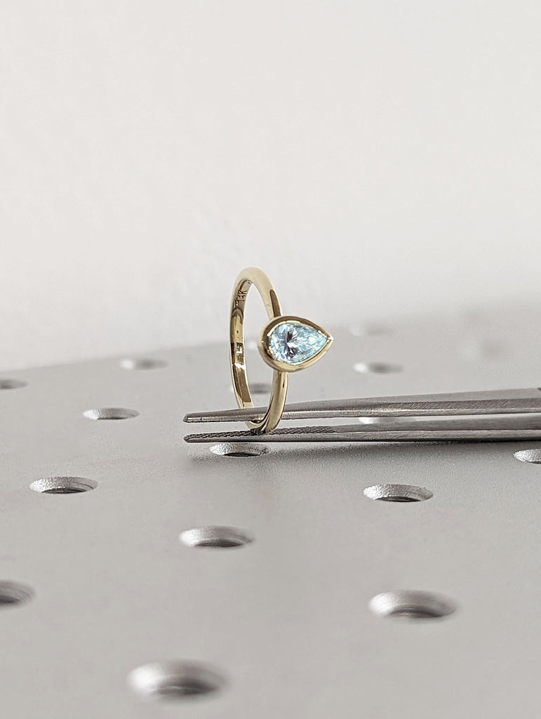 Pear cut Sky Blue Lab Cultured Aquamarine Solitaire 14K Yellow Gold Proposal Ring