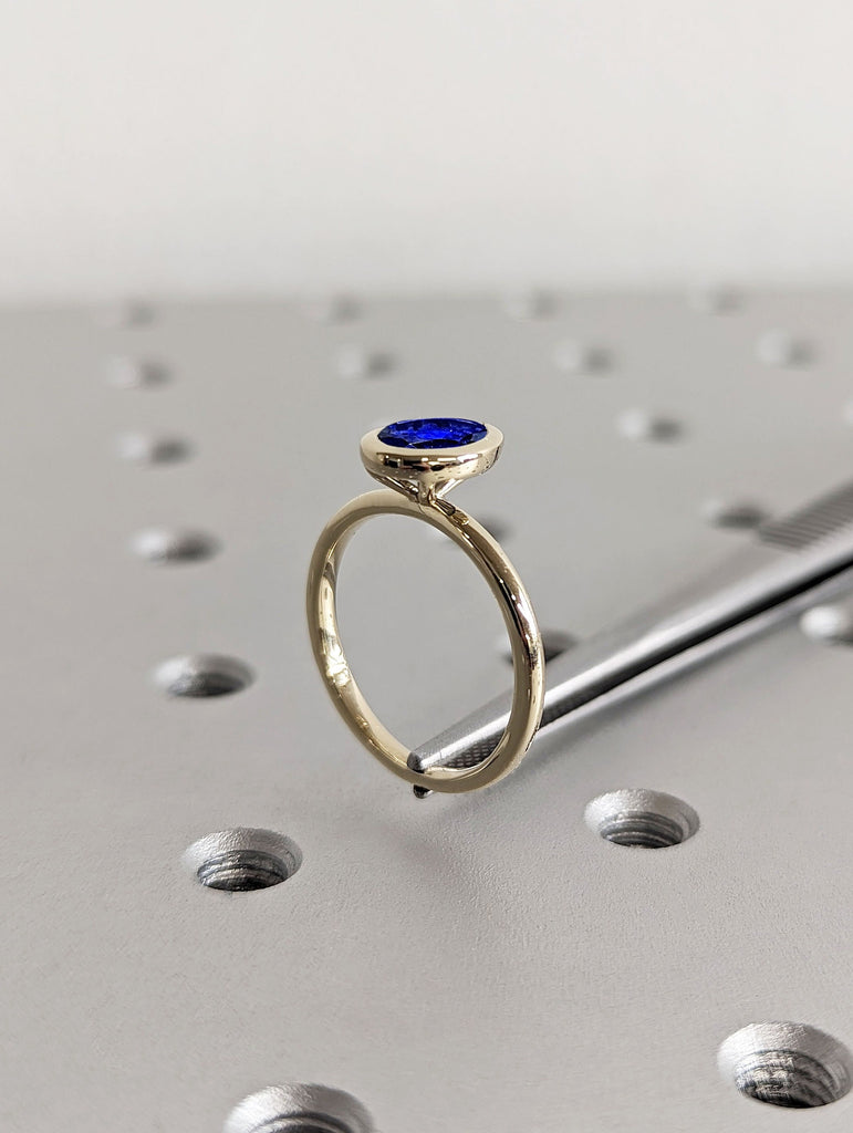 Oval cut Lab Sapphire Solitaire 14K Yellow Gold Wedding Anniversary Ring